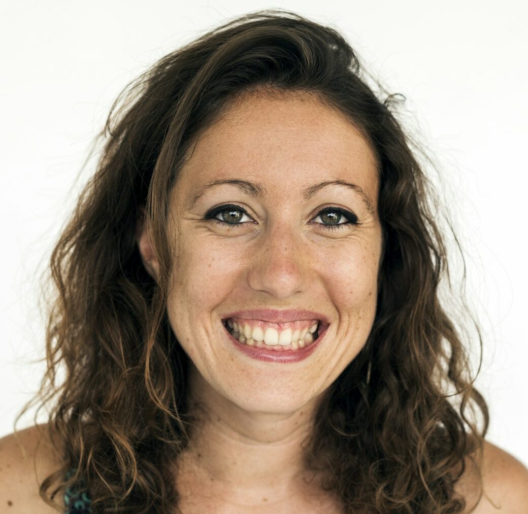 Caucasian woman smiling face expression headshot portrait